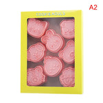 outils pâtisserie emporte pièces biscuits animaux dessin animé cartoon orange vert rose beige