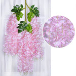 guirlande fleurs artificielles violettes blanches roses feuilles vertes extérieur moderne décoration branches accrochéesextérieur exposition