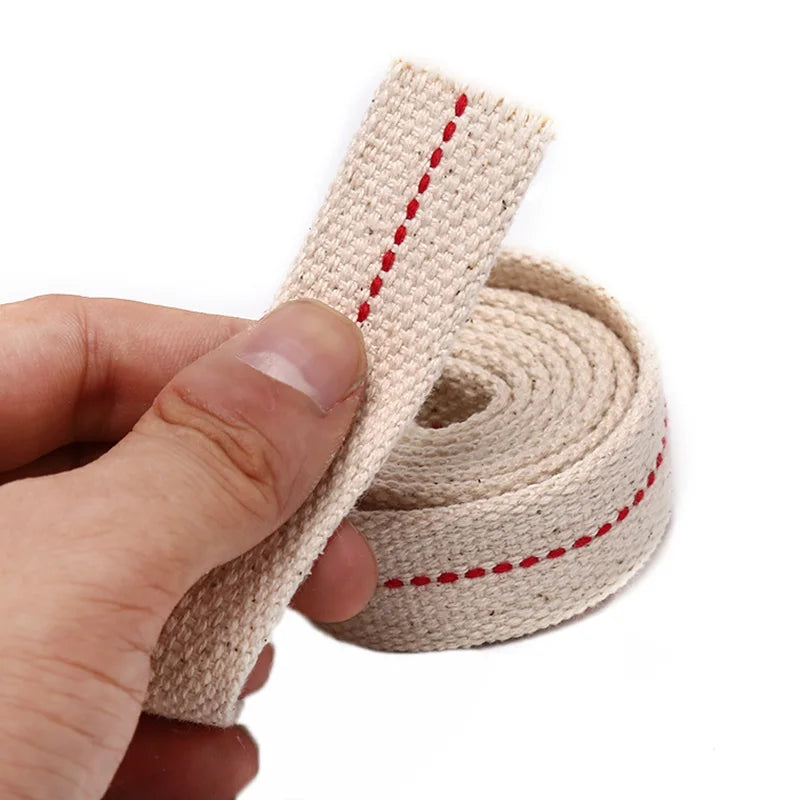 ruban tissé pointillé rouge beige clair textile longue mèche lampe huile mât lumière thuyền