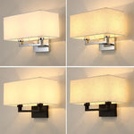 Applique murale LED double tête avec abat-jour en tissu blanc dans une chambre moderne