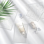 plateau rangement bijoux transparent moderne texture granulée fixations doré minimaliste