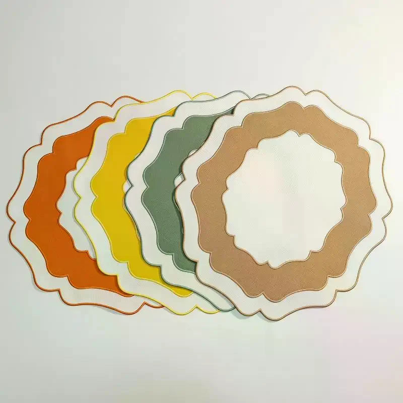 sets table orange moderne motifs concentriques bord ondulé tissu texturé infroissable