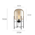 lampe sol moderne transparente ampoule filament noir gris fumé led verre minimaliste