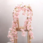 guirlande fleurs artificielles cerises rose clair décor mariage romantiqueintérieur festive