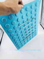 plateau instruments dentaires bleu turquoise texturé cercles relief opaques professionnel
