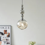 suspension lumineuse moderne transparente gris fumé texture ondulée brillante chambre salon étude