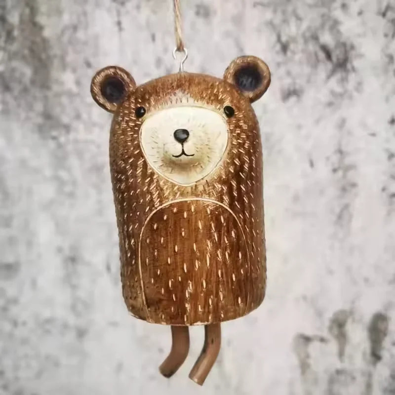 cloches décoratives animaux ours renard hibou motifs poils plumes artisanal extérieur