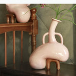 vase décoratif moderne rose marron nuance sculptural asymétrique fixations pied