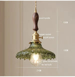 suspension lumineuse vintage vert doré motifs géométriques ampoules câbles chaînes métal