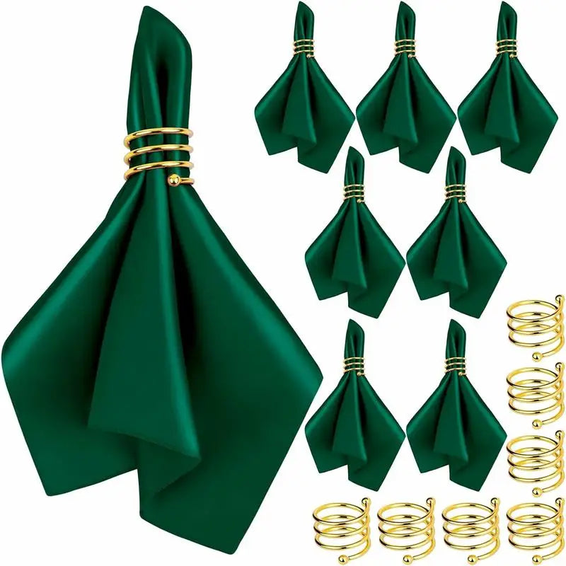 serviettes pliées serviettes satin noir or bleu roi classiques anneaux dorés table