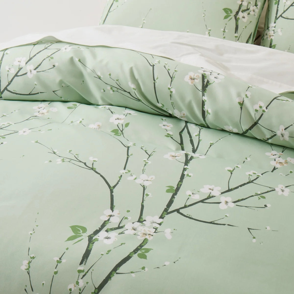 Détail de l'impression 3D des branches botaniques sur la housse de couette