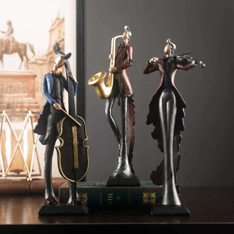 statues musiciens noir bleu doré texture métallique art deco instruments musicaux base solide vintage