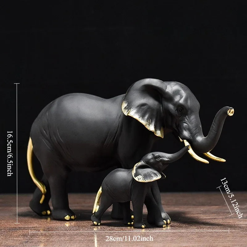 statues éléphants résine blanc noir or détails dorés classique élégant animal compagnie feng shui