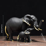 statues éléphants résine blanc noir or détails dorés classique élégant animal compagnie feng shui