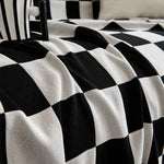 housse canapé moderne carreaux géométriques noir blanc vert olive coton polyester extérieur accueil