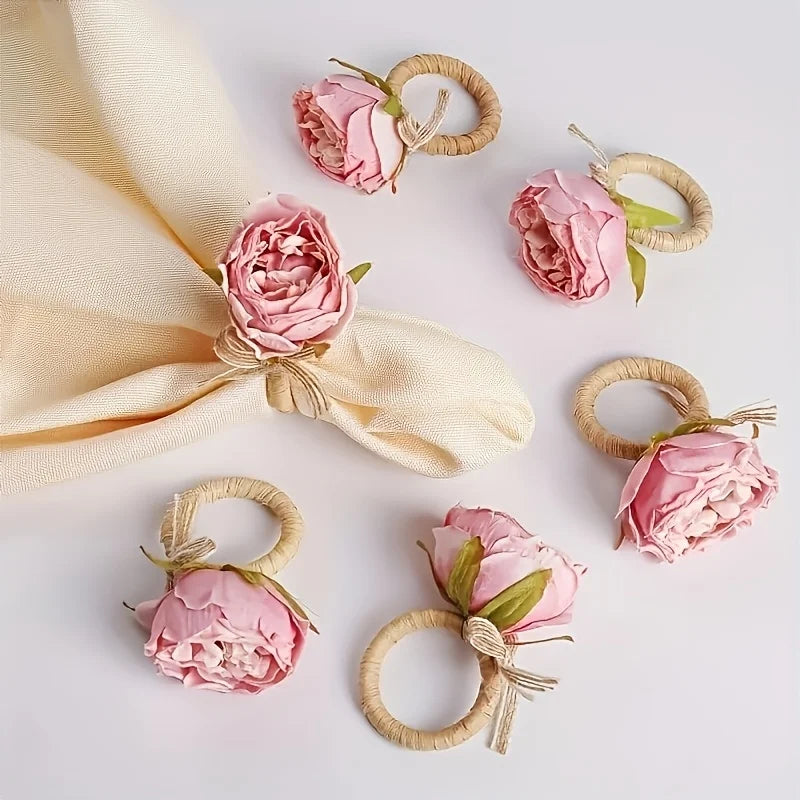 porte serviettes décoratifs jute fleurs rose serviettes tissu assiettes motifs géométriques verres transparents rustique