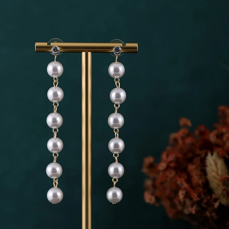 présentoir bijoux doré rangement boucles d'oreilles classique élégant support écrous fixations métal