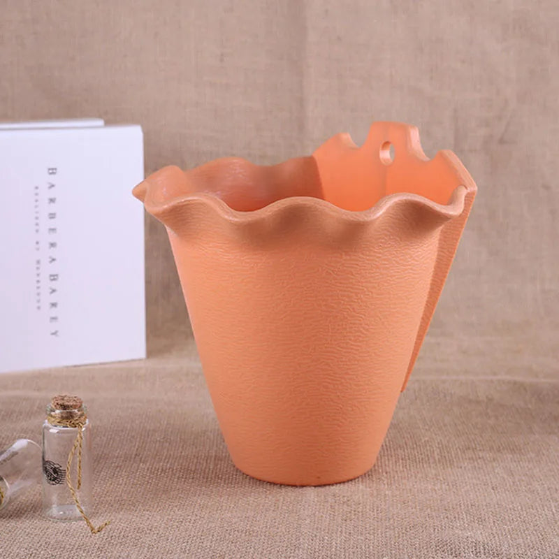 cache pot moderne fleurs artificielles texture cuir vert pastel rose orangé bleu crochets métalliquesintérieurextérieurdecoratifplastiquebeige