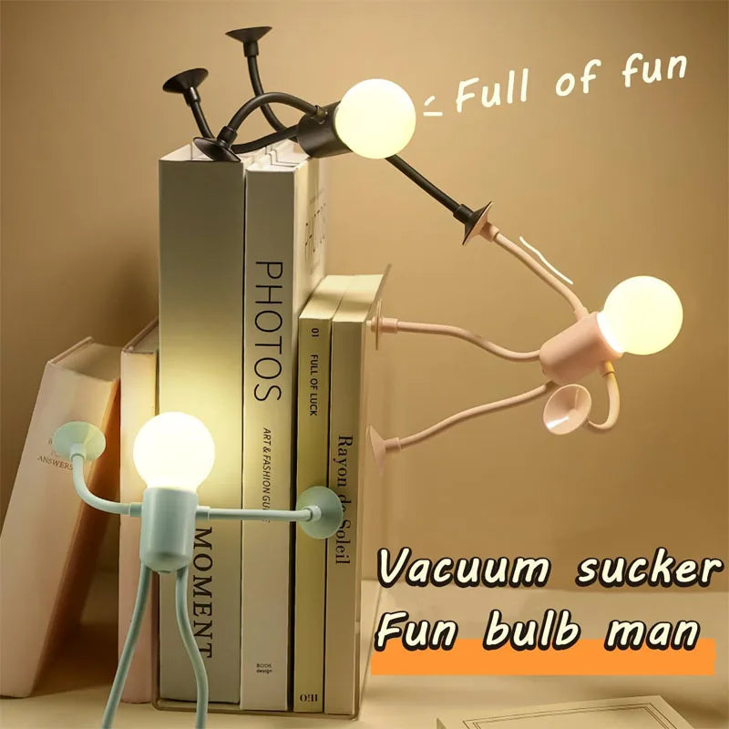 lampe led portable veilleuse nuit personnage stylisé bras articulés rose pâle bleu clair moderne