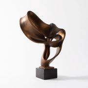 sculpture abstraite bronze moderne forme organique intérieur élégance contemporain ornement salon decoration