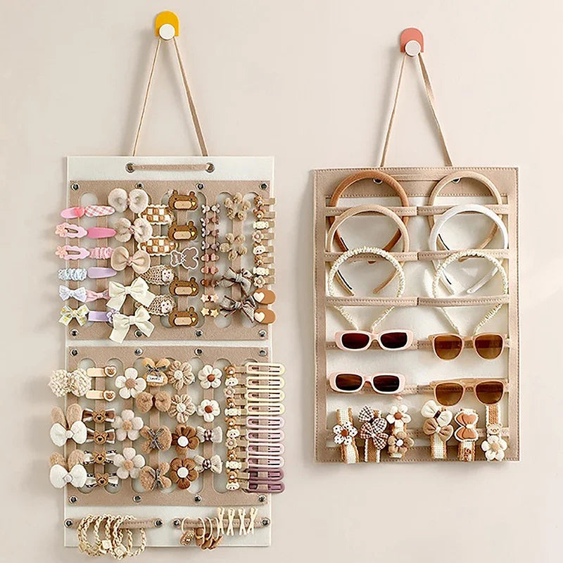 organisateur mural accessoires cheveux lunettes barrettes pinces élastiques nœuds fleurs peignes violet rose minimaliste