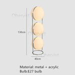 lampe sol moderne métal chromé boule acrylique blanche lumière led salon décoration intérieure