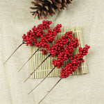 décoration noël baies rouges branches artificielles intérieur maison anniversaire festive mousse rouge blanc