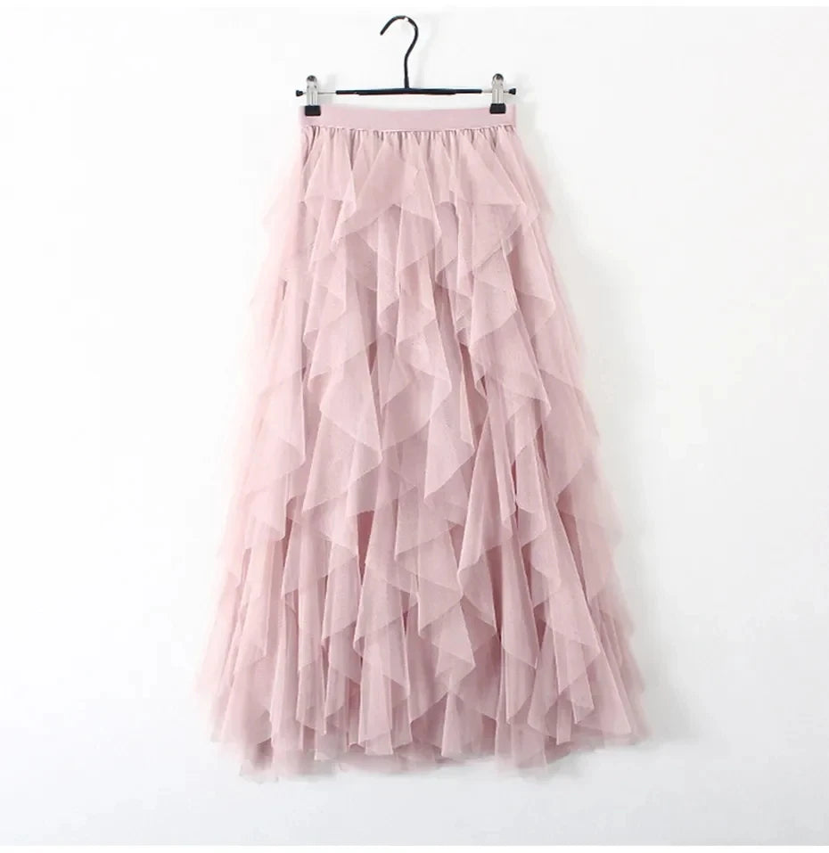 jupe plissée rose clair tulle élégante féminine streetwear élastiquée mi mollet translucent anneaux suspension