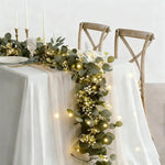 décoration intérieure guirlande eucalyptus lumières LED vert blanc doré festive rustic bohème chambre table