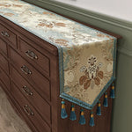 nappe décoration florale élégante beige bleu turquois bordure glands pomponsFRINGES