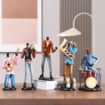 statues miniatures musiciens guitare saxophone trombone batterie décoration intérieure moderne stylisée