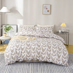 ensemble literie housse couette deux taies d'oreiller coeur gris blanc moderne