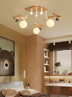lampe bois naturel avions sphères translucides vintage moderne chambre enfants