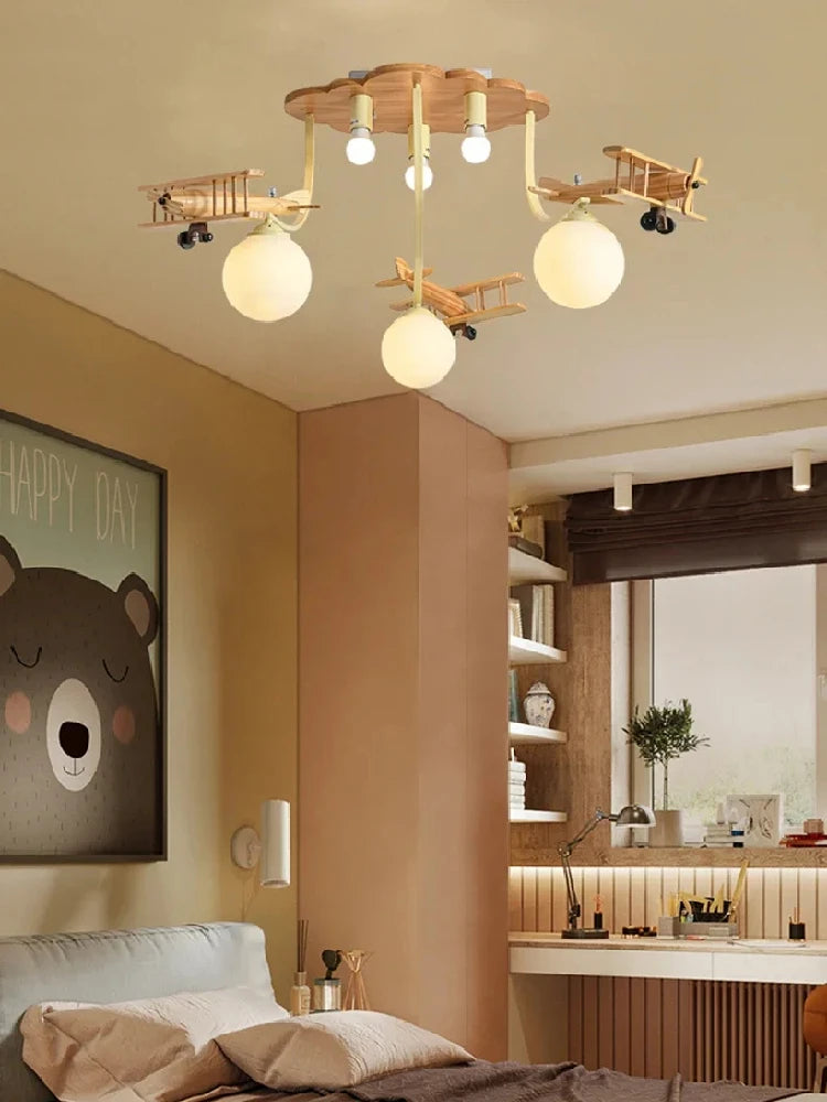 lampe bois naturel avions sphères translucides vintage moderne chambre enfants