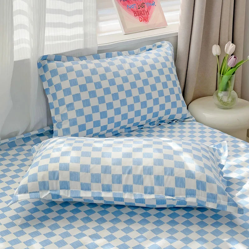 drap lit plat coton bleu clair blanc carreaux géométriques moderne deux oreillers