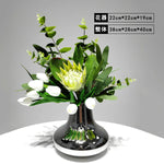 vase moderne argenté brillant fleurs artificielles blanches vertes décoration maison