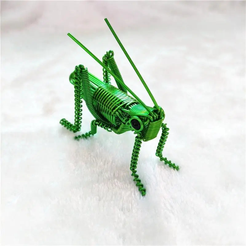 décoration créative insecte vert spirale métallique artisanal étagère unique adorable fait main exposé yeux