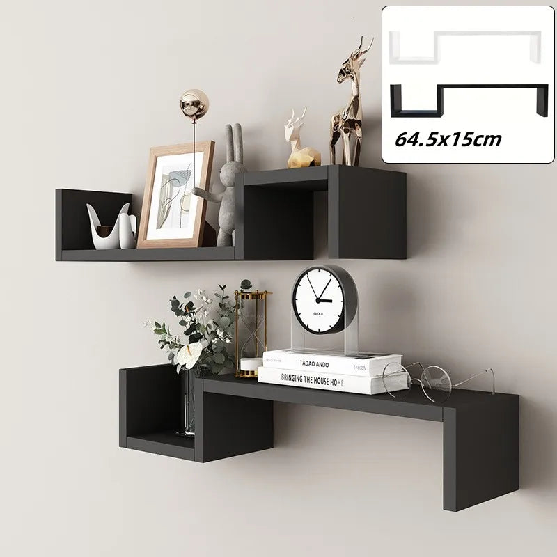 étagère murale moderne noire blanche rangement boîtes cadre photo vase horloge livre plante