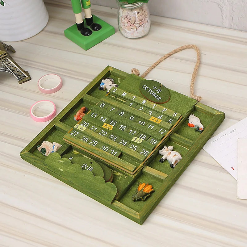 calendrier mural rustique vintage bois vert figurines animaux mois année grille dates