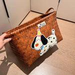 panier rangement rotin tissé marron clair brodé chien rustique poignées cuir décoration maison