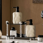distributeur savon liquide céramique beige texture granulée minimaliste accessoire salle bains après shampooing lotion