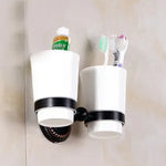 accessoires salle bain noir classiques rondelles dorées porte serviettes savon papier toilette brosse wc