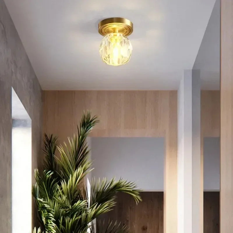 lampe moderne verre transparent noir doré élégante sphérique éclairage contemporain
