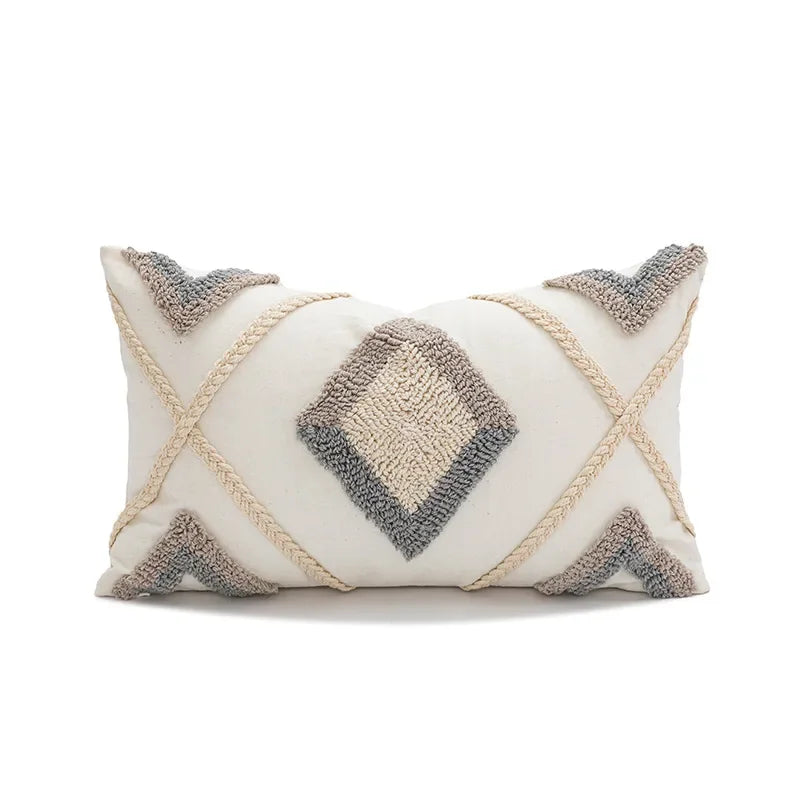 coussin décoratif boho chic blanc bleu marron beige doré motifs géométriques pompons coton