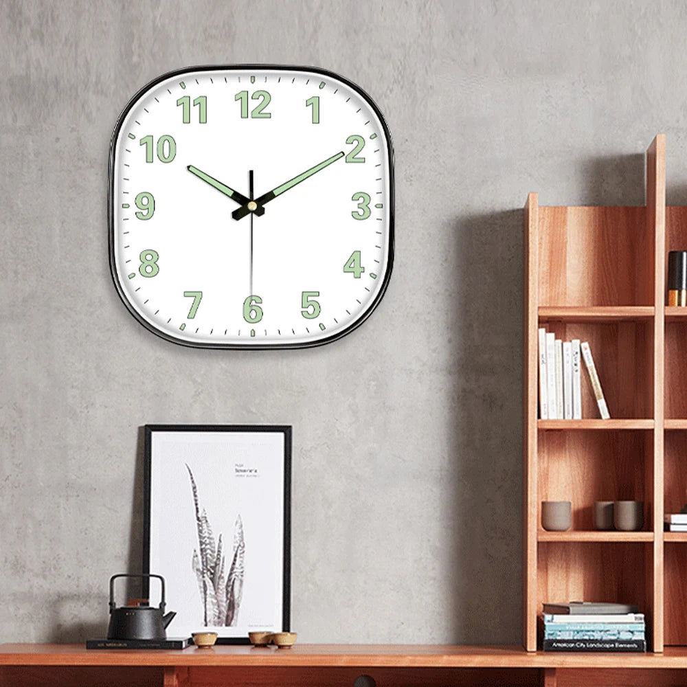 horloge murale moderne numéros lumineux vert cadre noir quartz aiguille simple transparente chambre salon