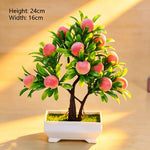 décoration intérieure arbre artificiel bonsaï pot blanc feuilles vertes fruits rouges tronc brun