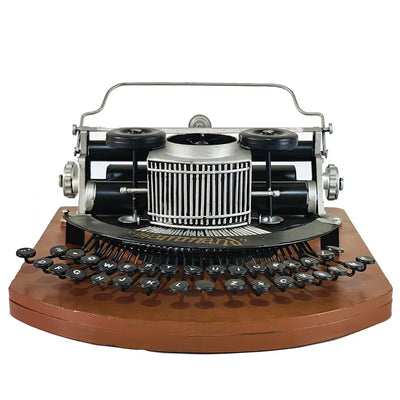 Machine à écrire vintage en métal pour décoration rétro sur étagère