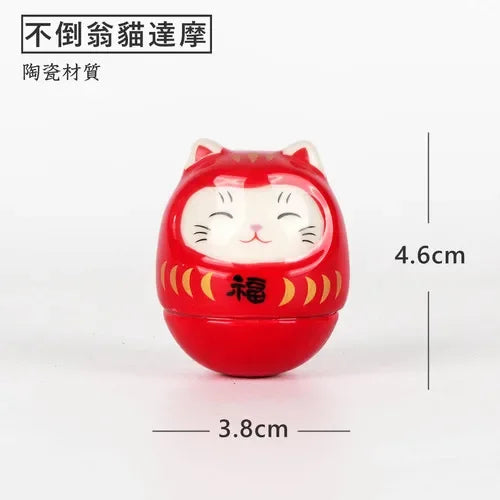 statue daruma gris relief sculpté artisanal traditionnel maison décoration bouddhiste