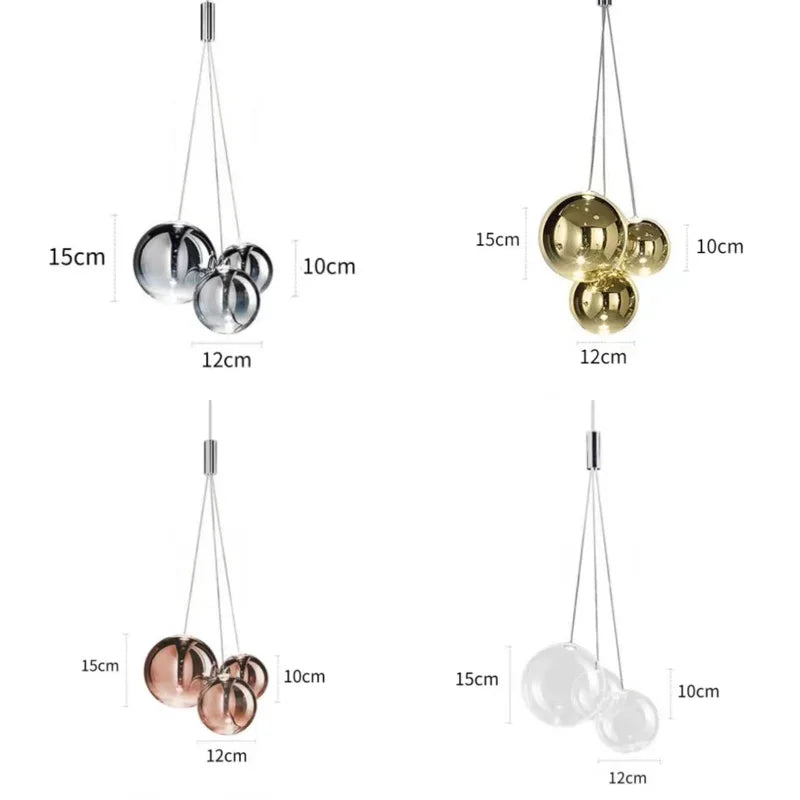 suspension lumineuse moderne sphères brillantes or argent transparentes chambre salle manger