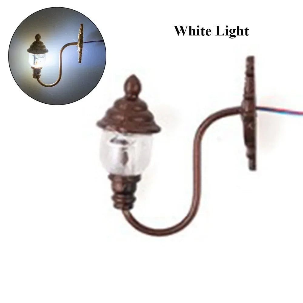 lampe murale miniature verte dorée noir bronze verre transparent vintage fil électrique